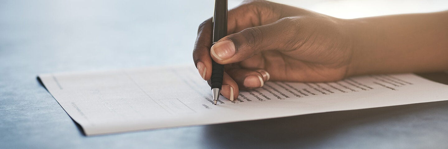 woman making a checklist