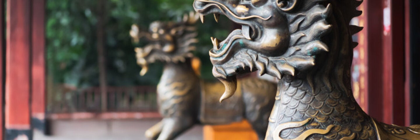 dragon statues outside a temple