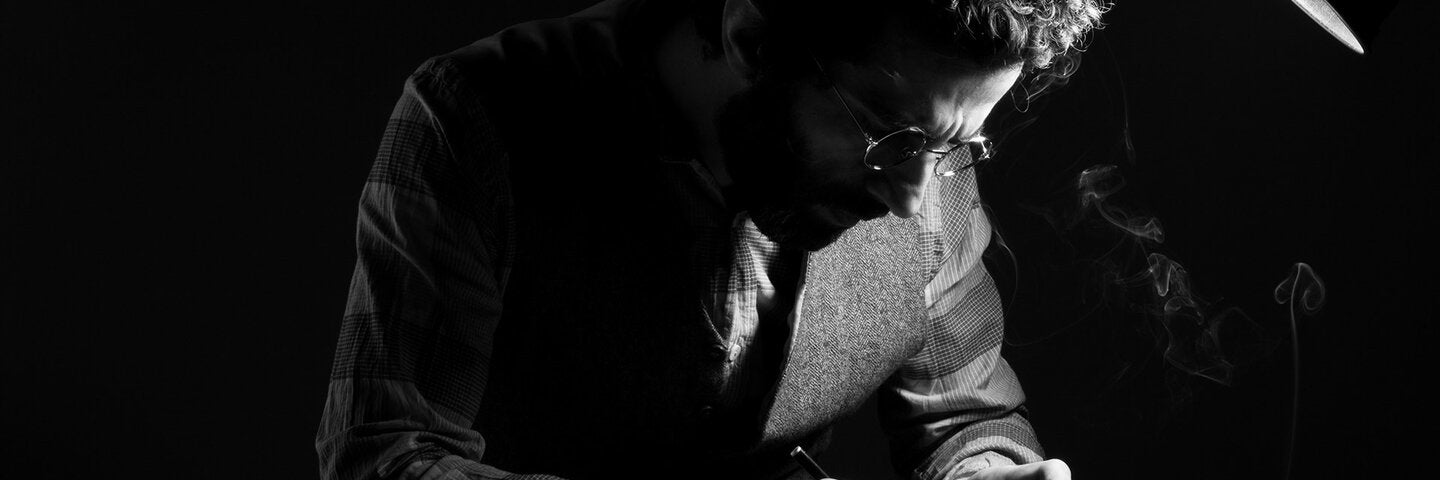 Screenwriting writing in a notepad