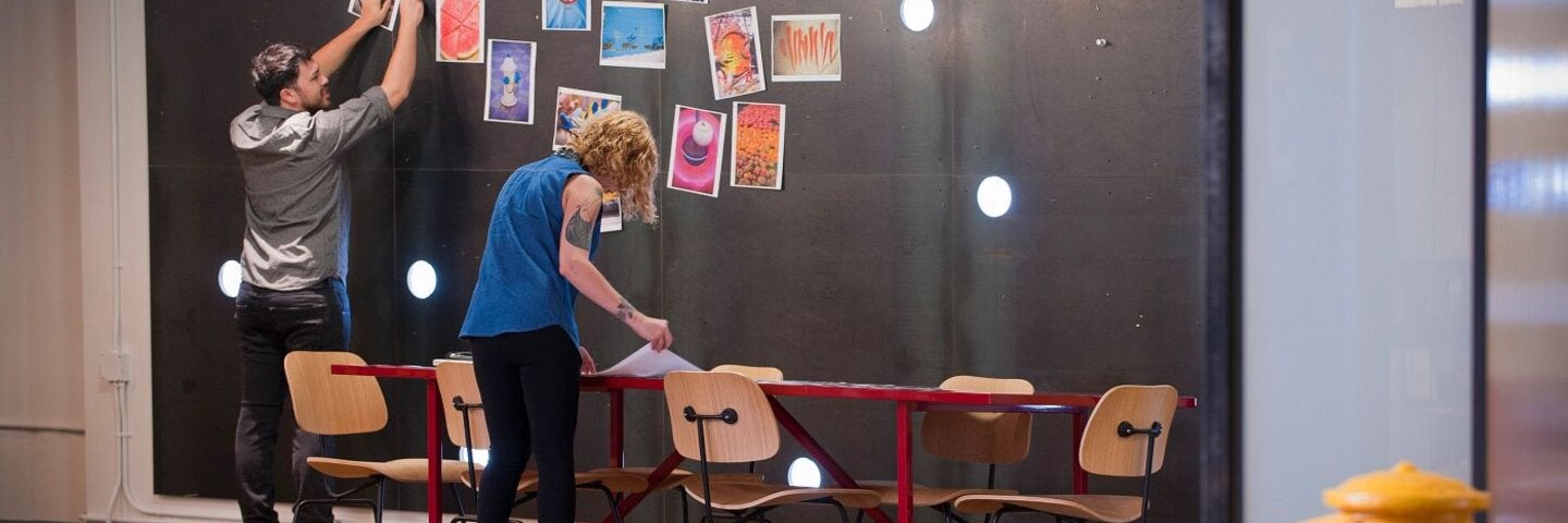 Designers brainstorming in graphic design office