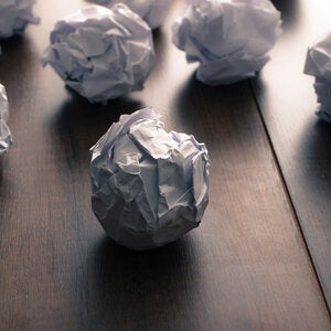 balled up paper on the floor