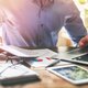 Man working on financials in office